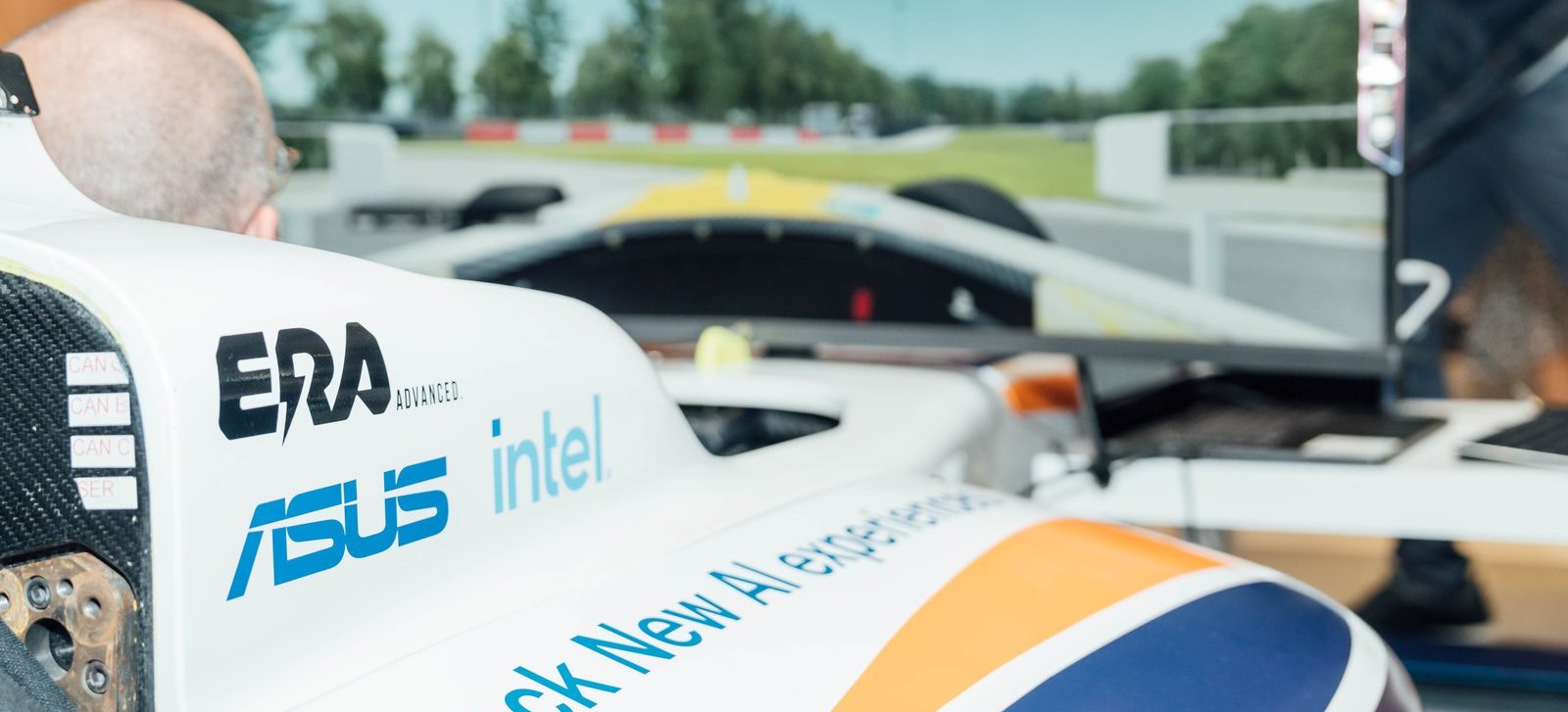 The full-size formula car simulator running an AI-assisted driver coaching experience.